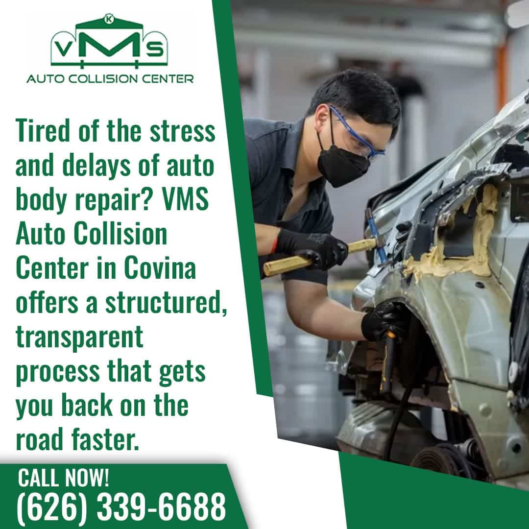 A VMS Auto Collision Center technician in Covina using specialized tools to repair a car's body, highlighting their structured and transparent repair process.