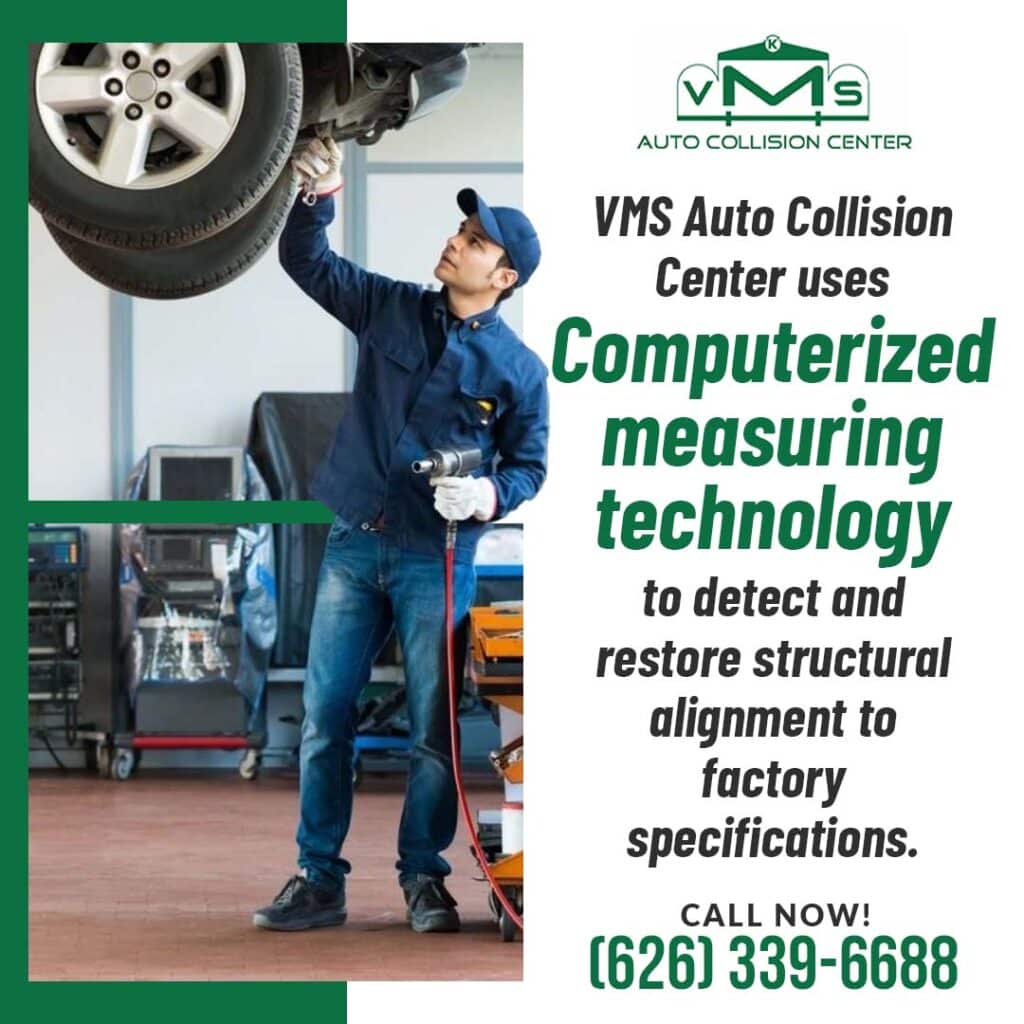 Technician using computerized measuring tools to inspect vehicle undercarriage for structural alignment in collision repair